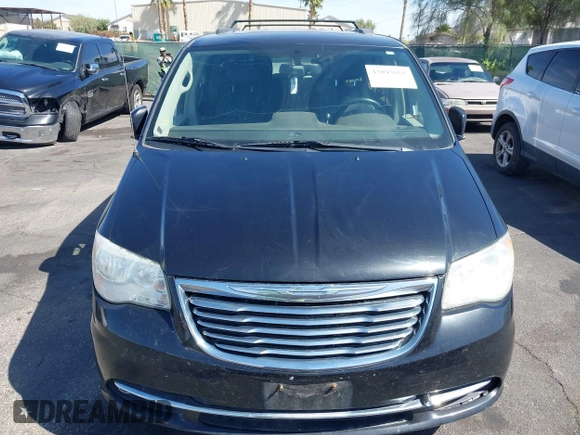 2011 Chrysler Town & Country Touring with VIN 2A4RR5DG2BR702731, listed as a IAAI auction lot 42095661 with 202,968 mi miles and . Bid and sale history available at DreamBid. Image 13.