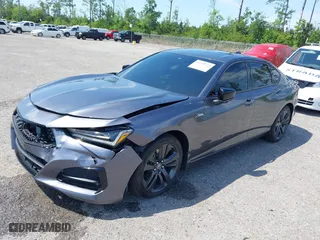 2022 Acura TLX w/A-Spec Package with VIN 19UUB5F55NA002177, listed as a IAAI auction lot 41208723 with 58,795 mi miles. Bid and sale history available at carsss.com. Image 2.