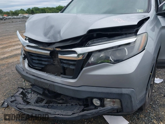 2017 Honda Ridgeline RTL with VIN 5FPYK3F52HB019266, listed as a IAAI auction lot 42638081 with 117,004 mi miles and . Bid and sale history available at DreamBid. Image 6.