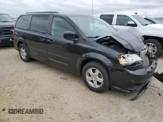 2012 Dodge Grand Caravan SXT with VIN 2C4RDGCG5CR253449, listed as a Copart auction lot 54592975 with 86,200 mi miles and Non Repairable. Bid and sale history available at DreamBid. Image 4.