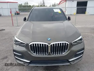 2022 BMW X5 xDrive45e z VIN 5UXTA6C00N9L06383, wystawiony jako IAAI lot #38552162 z przebiegiem 19 592 mil mil oraz . Historia ofert i sprzedaży dostępna na DreamBid. Obrazek 6.
