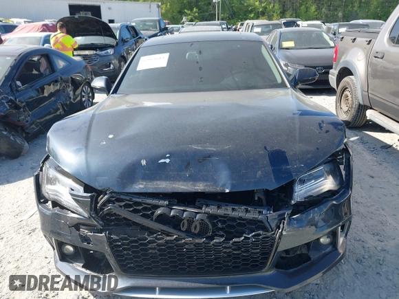 2012 Audi A7 Prestige with VIN WAUSGAFC0CN008552, listed as a IAAI auction lot 42068614 with 107,400 mi miles and . Bid and sale history available at DreamBid. Image 12.