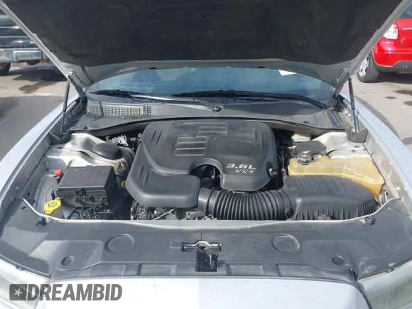 2012 Dodge Charger SE with VIN 2C3CDXBG5CH101849, listed as a IAAI auction lot 42053824 with 194,274 mi miles and . Bid and sale history available at DreamBid. Image 10.