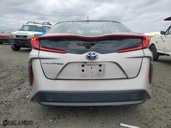 2021 Toyota Prius Prime LE with VIN JTDKAMFP7M3175920, listed as a Copart auction lot 43618755 with 105,228 mi miles and Salvage Title. Bid and sale history available at carsss.com. Image 6.