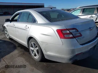 2013 Ford Taurus SEL with VIN 1FAHP2E83DG224780, listed as a IAAI auction lot 41675601 with 166,977 mi miles. Bid and sale history available at carsss.com. Image 3.
