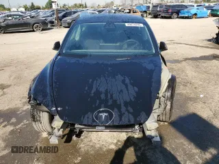 2025 Tesla Model 3 Long Range with VIN 5YJ3E1EA0SF902836, listed as a Copart auction lot 49674245 with 3,302 mi miles and Salvage Title. Bid and sale history available at DreamBid. Image 5.