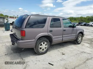 1998 Oldsmobile Bravada z VIN 1GHDT13W9W2718457, wystawiony jako Copart lot #55341755 z przebiegiem 133 968 mil mil oraz Tytuł czysty. Historia ofert i sprzedaży dostępna na DreamBid. Obrazek 3.