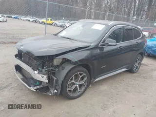 2017 BMW X1 xDrive28i with VIN WBXHT3C31H5F72958, listed as a IAAI auction lot 41782257 with 134,829 mi miles. Bid and sale history available at carsss.com. Image 2.