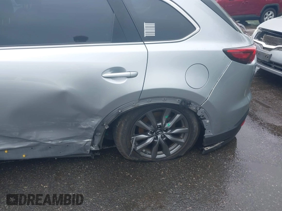 2020 Mazda CX-9 Touring with VIN JM3TCBCY8L0400787, listed as a IAAI auction lot 42188981 with 86,459 mi miles and . Bid and sale history available at DreamBid. Image 6.