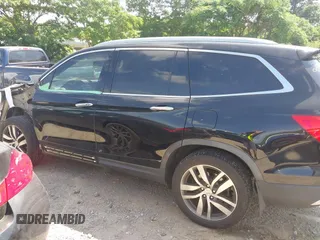 2017 Honda Pilot Touring с VIN 5FNYF5H9XHB024868, выставлен на аукционе IAAI как лот 42300608 с пробегом 133 018 миль миль и . История ставок и продаж доступна на DreamBid. Изображение 15.