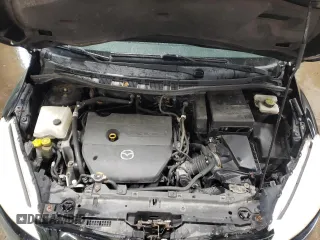 2012 Mazda 5 Touring with VIN JM1CW2CLXC0114623, listed as a Copart auction lot 52036475 with 149,589 mi miles and Salvage Title. Bid and sale history available at DreamBid. Image 11.