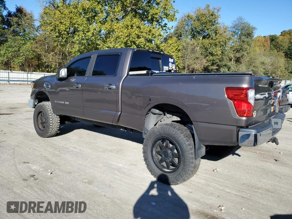 2016 Nissan Titan XD PRO-4X with VIN 1N6BA1F4XGN502630, listed as a Copart auction lot 75690604 with 183,158 mi miles and Clean Title. Bid and sale history available at carsss.com. Image 2.