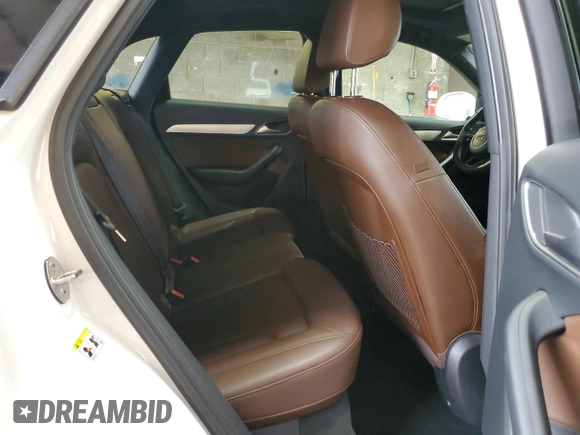 2018 Audi Q3 Premium with VIN WA1BCCFS9JR000127, listed as a Copart auction lot 58555755 with 60,295 mi miles and Salvage title. Bid and sale history available at DreamBid. Image 11.