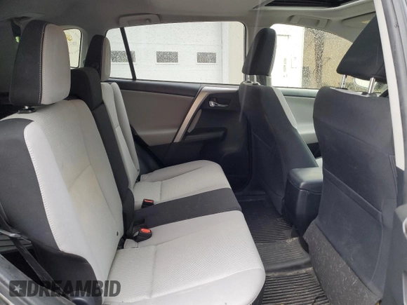 2018 Toyota RAV4 XLE with VIN JTMRFREV2JJ200677, listed as a Copart auction lot 59660535 with 82,283 mi miles and Salvage title. Bid and sale history available at DreamBid. Image 11.