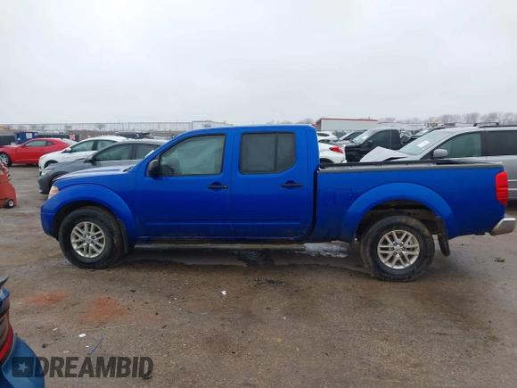 2014 Nissan Frontier SL z VIN 1N6AD0FVXEN705391, wystawiony jako IAAI lot #41539414 z przebiegiem 48 555 mil mil oraz . Historia ofert i sprzedaży dostępna na DreamBid. Obrazek 14.