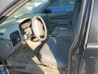 1996 Chevrolet Caprice with VIN 1G1BL82P2TR106404, listed as a Copart auction lot 74213214 with 156,588 mi miles and Salvage title. Bid and sale history available at DreamBid. Image 7.