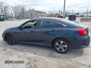 2019 Honda Civic LX with VIN 2HGFC2F61KH564474, listed as a IAAI auction lot 42156385 with 239,694 mi miles and . Bid and sale history available at DreamBid. Image 14.
