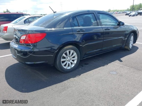 2010 Chrysler Sebring Limited with VIN 1C3CC5FB9AN147436, listed as a IAAI auction lot 42016922 with 161,339 mi miles. Bid and sale history available at carsss.com. Image 4.