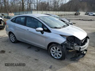 2012 Ford Fiesta SE with VIN 3FADP4BJ9CM121045, listed as a Copart auction lot 47297575 with 83,785 mi miles and Salvage Title. Bid and sale history available at DreamBid. Image 4.