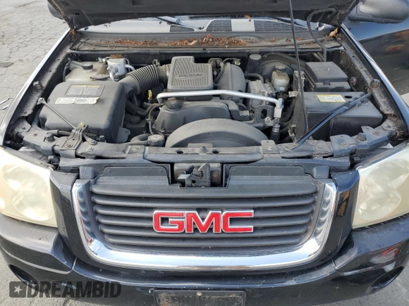 2003 GMC Envoy SLT with VIN 1GKES16SX36220489, listed as a Copart auction lot 71859834 with 148,811 mi miles and Salvage Title. Bid and sale history available at DreamBid. Image 12.