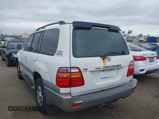 2001 Toyota Land Cruiser z VIN JTEHT05J412004663, wystawiony jako IAAI lot #42192078 z przebiegiem 358 917 mil mil oraz . Historia ofert i sprzedaży dostępna na DreamBid. Obrazek 3.