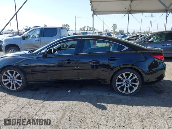 2015 Mazda 6 i Grand Touring with VIN JM1GJ1W61F1165006, listed as a IAAI auction lot 41988778 with 113,226 mi miles and . Bid and sale history available at carsss.com. Image 14.