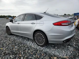 2018 Ford Fusion Titanium with VIN 3FA6P0D91JR207051, listed as a Copart auction lot 59539135 with 204,017 mi miles and Salvage title. Bid and sale history available at DreamBid. Image 2.
