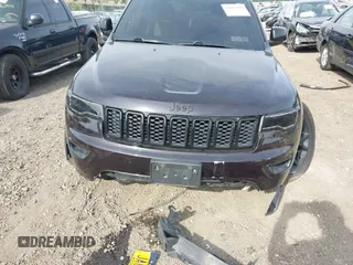 2021 Jeep Grand Cherokee 80th Anniversary with VIN 1C4RJFBG1MC600239, listed as a IAAI auction lot 42103490 with 47,005 mi miles and . Bid and sale history available at DreamBid. Image 13.