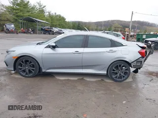 2019 Honda Civic Sport with VIN 19XFC2F81KE034047, listed as a IAAI auction lot 41995614 with 91,303 mi miles and . Bid and sale history available at DreamBid. Image 15.