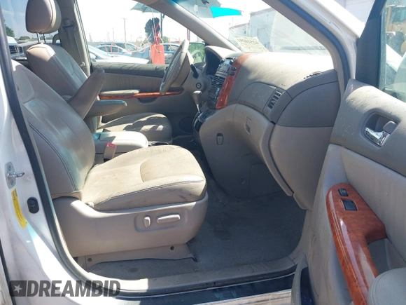 2010 Toyota Sienna XLE with VIN 5TDYK4CC3AS294129, listed as a IAAI auction lot 42510201 with 200,601 mi miles and . Bid and sale history available at DreamBid. Image 5.