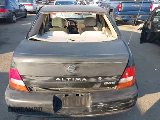 1999 Nissan Altima XE with VIN 1N4DL01D1XC226461, listed as a IAAI auction lot 41449355 with 193,000 mi miles. Bid and sale history available at carsss.com. Image 16.