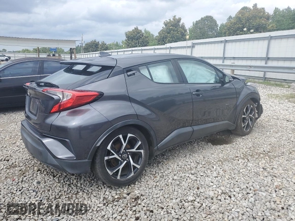 2018 Toyota C-HR XLE z VIN NMTKHMBX7JR004515, wystawiony jako Copart lot #57106385 z przebiegiem Nie podano mil oraz Szkoda całkowita • Salvage title. Historia ofert i sprzedaży dostępna na DreamBid. Obrazek 3.