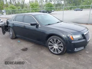 2013 Chrysler 300 with VIN 2C3CCABT2DH735764, listed as a IAAI auction lot 41977616 with 164,517 mi miles. Bid and sale history available at carsss.com. Image 1.