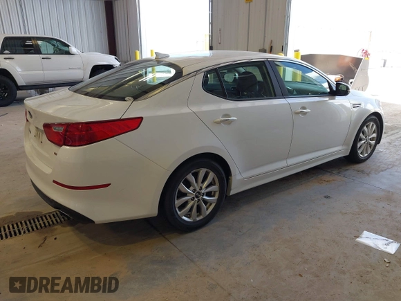 2015 Kia Optima LX with VIN KNAGM4A79F5616665, listed as a IAAI auction lot 42121526 with 153,022 mi miles. Bid and sale history available at carsss.com. Image 4.