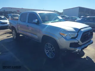 2023 Toyota Tacoma 4WD SR with VIN 3TMCZ5AN0PM633759, listed as a IAAI auction lot 41737547 with 30,374 mi miles. Bid and sale history available at carsss.com. Image 1.