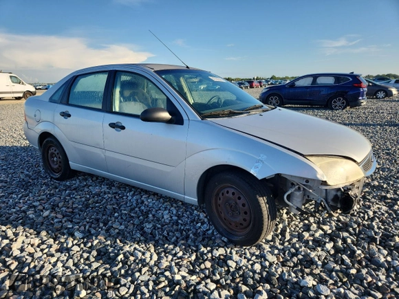 2007 Ford Focus S with VIN 1FAFP34N87W278008, listed as a Copart auction lot 61022545 with 139,575 mi miles and Salvage title. Bid and sale history available at DreamBid. Image 4.