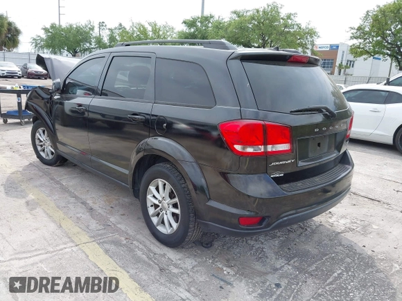 2015 Dodge Journey SXT with VIN 3C4PDCBB3FT577121, listed as a IAAI auction lot 41855712 with Not Provided miles and . Bid and sale history available at DreamBid. Image 3.