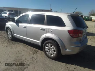 2014 Dodge Journey American Value Pkg with VIN 3C4PDCAB2ET186199, listed as a IAAI auction lot 41594478 with 145,936 mi miles. Bid and sale history available at carsss.com. Image 3.