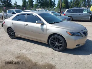 2007 Toyota Camry z VIN JTNBB46K573032059, wystawiony jako IAAI lot #42425482 z przebiegiem 215 775 mil mil oraz . Historia ofert i sprzedaży dostępna na DreamBid. Obrazek 1.