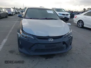 2014 Scion tC z VIN JTKJF5C79E3073875, wystawiony jako IAAI lot #41536021 z przebiegiem 158 154 mil mil oraz . Historia ofert i sprzedaży dostępna na DreamBid. Obrazek 12.