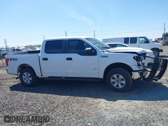 2015 Ford F-150 XLT z VIN 1FTEW1EPXFKE20880, wystawiony jako IAAI lot #42034493 z przebiegiem 152 588 mil mil oraz . Historia ofert i sprzedaży dostępna na DreamBid. Obrazek 13.