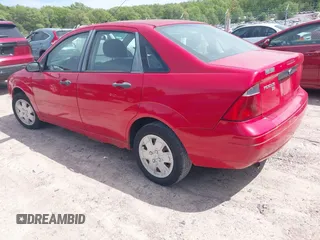 2007 Ford Focus S z VIN 1FAFP34N17W299881, wystawiony jako IAAI lot #42282442 z przebiegiem 144 782 mil mil oraz . Historia ofert i sprzedaży dostępna na DreamBid. Obrazek 3.