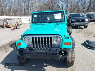 1997 Jeep Wrangler Sport with VIN 1J4FY19S2VP423426, listed as a IAAI auction lot 41734992 with 164,706 mi miles. Bid and sale history available at carsss.com. Image 12.
