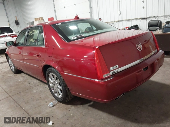 2009 Cadillac DTS w/1SA with VIN 1G6KD57Y59U149387, listed as a IAAI auction lot 41957750 with 94,939 mi miles. Bid and sale history available at carsss.com. Image 3.