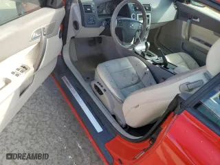 2009 Volvo C70 with VIN YV1MC67289J071998, listed as a Copart auction lot 74210594 with 0 mi miles and Salvage Title. Bid and sale history available at carsss.com. Image 8.