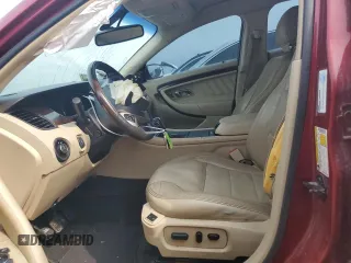 2014 Ford Taurus Limited z VIN 1FAHP2F82EG141034, wystawiony jako Copart lot #52579995 z przebiegiem 207 709 mil mil oraz Szkoda całkowita • Salvage title. Historia ofert i sprzedaży dostępna na DreamBid. Obrazek 7.