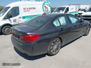 2019 BMW 5 Series 530i xDrive with VIN WBAJA7C50KG910479, listed as a IAAI auction lot 41802413 with 84,932 mi miles. Bid and sale history available at carsss.com. Image 4.