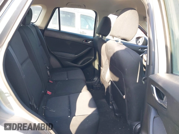 2014 Mazda CX-5 Sport with VIN JM3KE2BE9E0330345, listed as a IAAI auction lot 41377335 with 103,340 mi miles and . Bid and sale history available at carsss.com. Image 8.