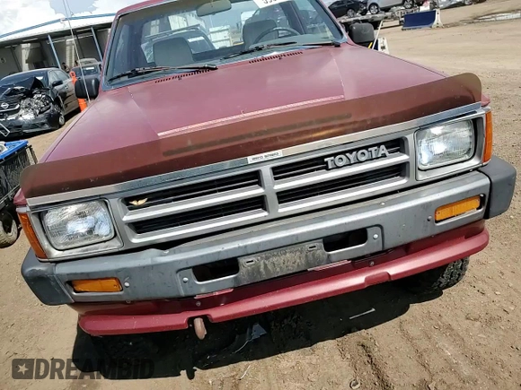 1988 Toyota Pickup с VIN JT4RN63A7J5038197, выставлен на аукционе Copart как лот 59910655 с пробегом 76 519 миль миль и Чистый • Clean title. История ставок и продаж доступна на DreamBid. Изображение 13.