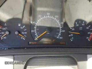 1999 Mercedes-Benz E-Class with VIN WDBJF70H5XA831773, listed as a Copart auction lot 71320244 with 145,181 mi miles and Salvage Title. Bid and sale history available at carsss.com. Image 9.